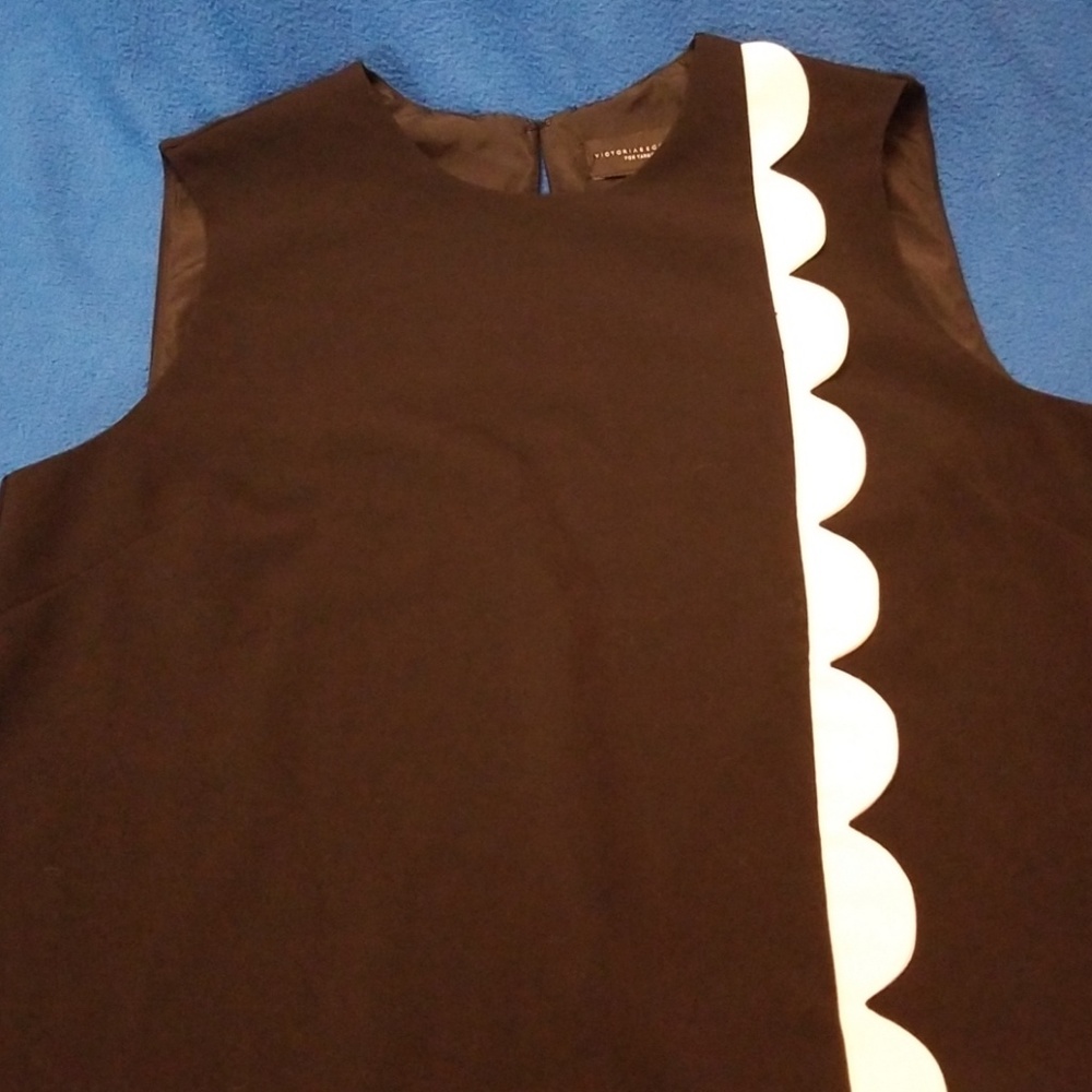 Victoria Beckham. Size larger.